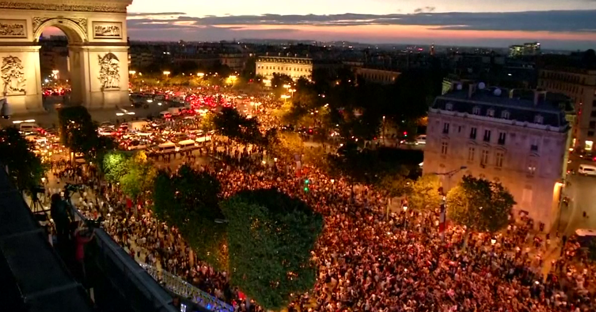 Fans celebrate France's World Cup semifinal win on Paris's Champs